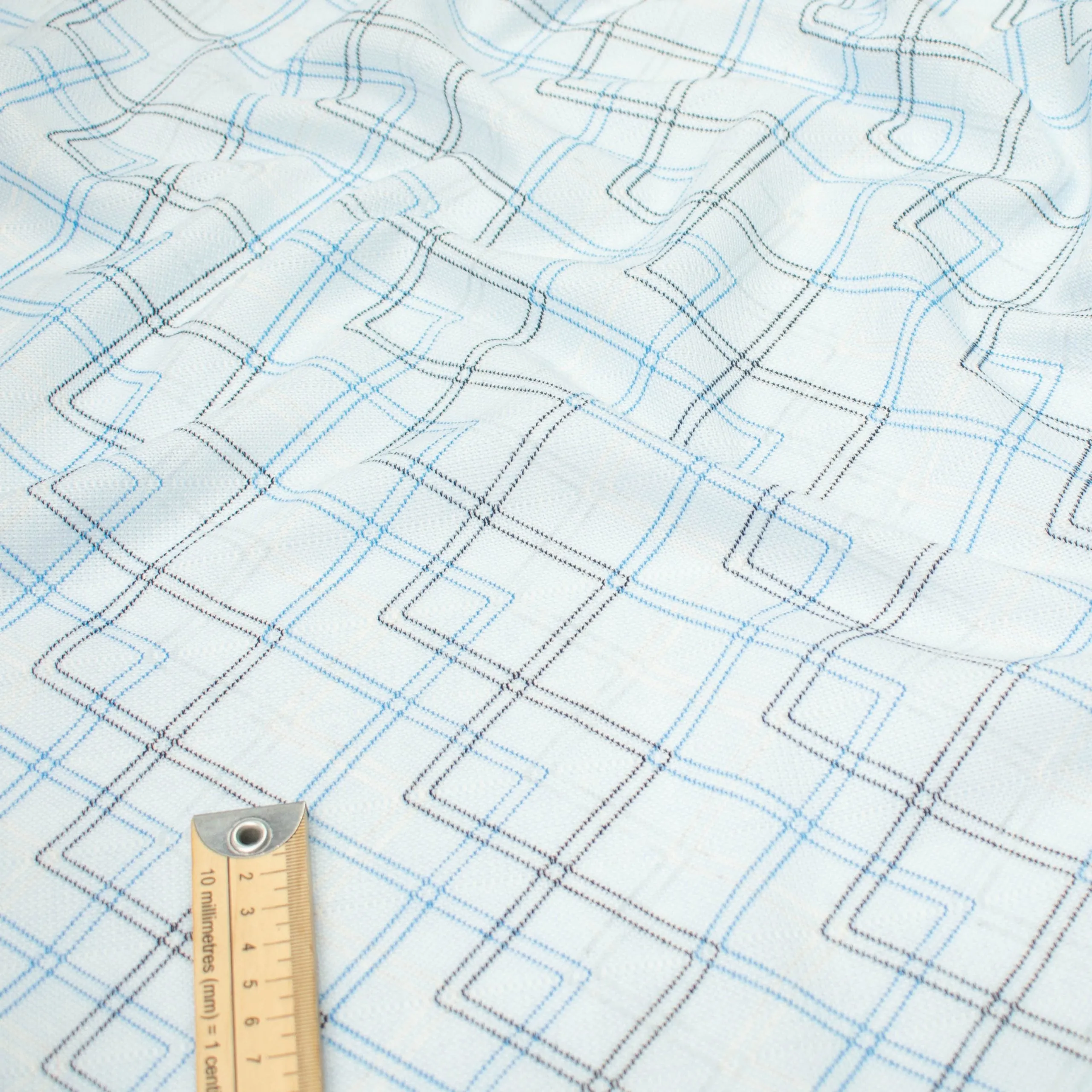 Printed Knits Design-17 Black Geometric On Sky Blue